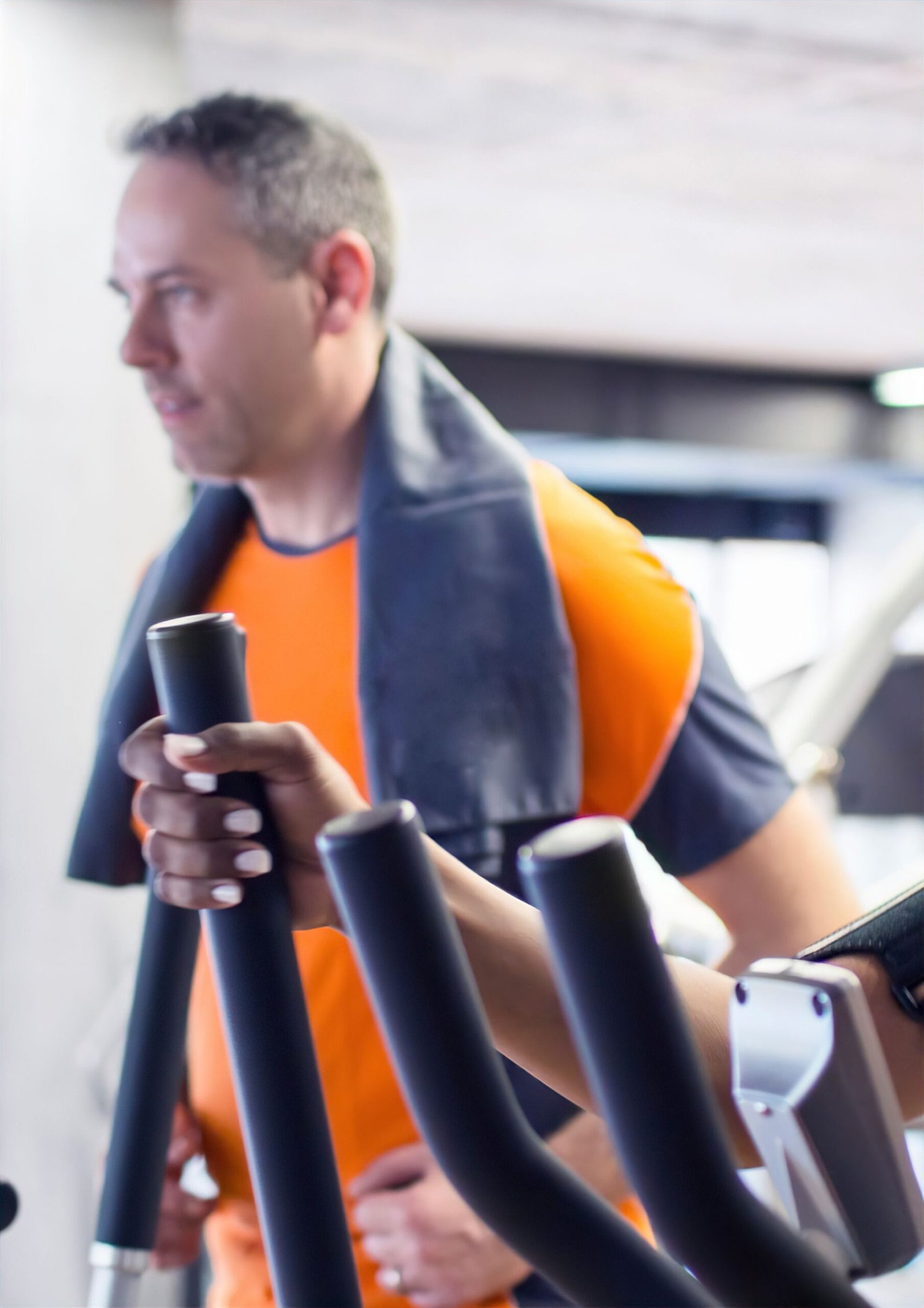 Elliptical Holding the Bar